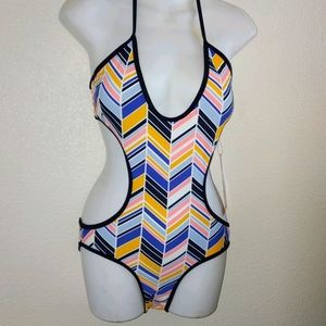 Capri side cut out 1 piece swim suit Size Medium